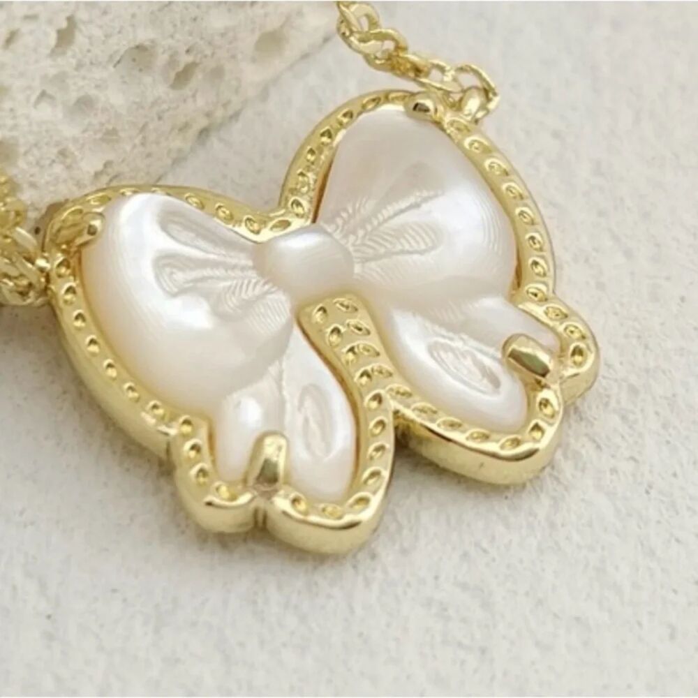 NWOT Kendra Scott Haley Bow Ivory Mother Of Pearl Gold Necklace - Picture 10 of 16